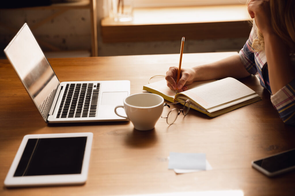 A lady writing her content